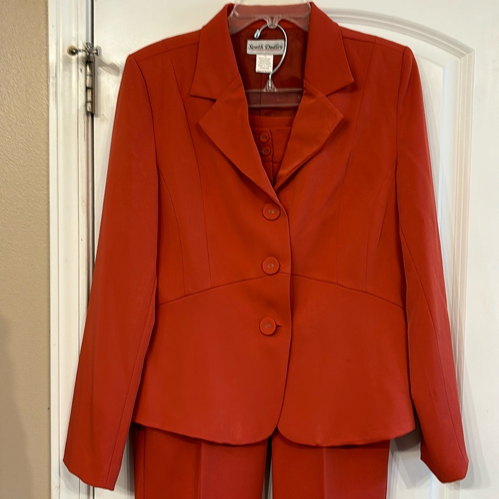 Burnt Orange pants suit: Jacket is size 12 and pants is size 8
